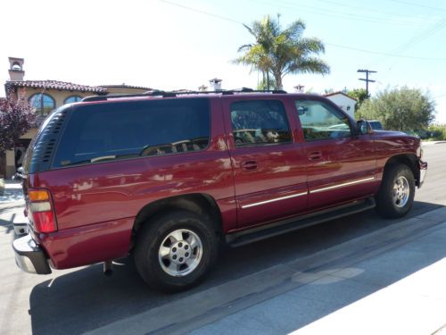 2wd, red exterior with tan interior, very good condition