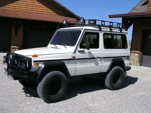 A gwagen ready for off road duty lift winch rack arb bumper kc lights bfg ats