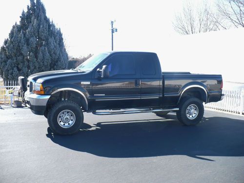 2000 super duty 7.3 diesel super cab  4 inch  lift  4 x 4         no reserve