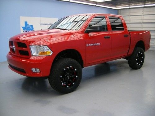 We finance!!!  2012 ram 1500 4x4 hemi auto tiptronic lift kit sat 20 rims 1 own