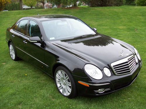 2007 m.b. e550 4matic sedan. black on black. garaged. by original private owner!