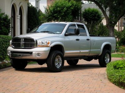 Quad cab long bed ( laramie ) lifted! mint...