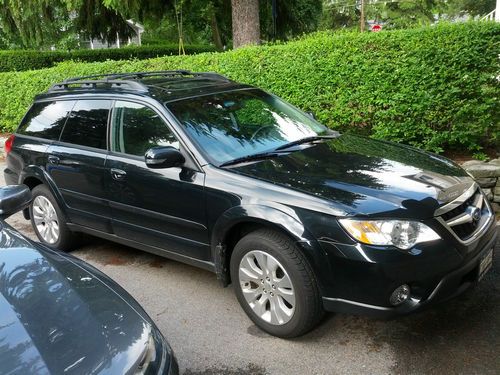 2009 subaru outback h6 limited    33k miles.