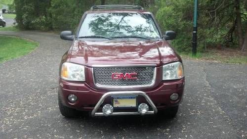 2002 gmc envoy sle suv sunroof, 4wd, push bar, custom wheels/grille, garage kept