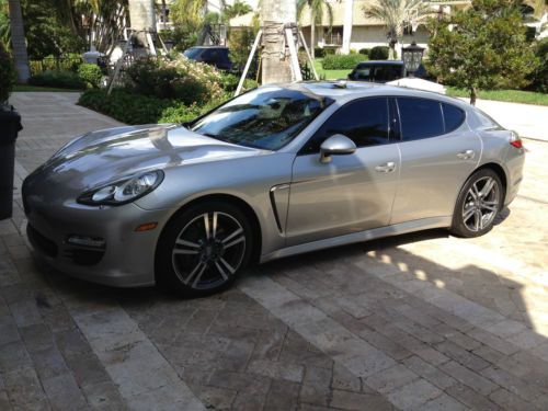 Metallic silver, blue leather, 1-owner, showroom, 8,700 miles, factory warranty