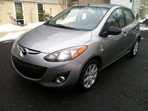 2012 mazda 2 sport drives and runs 100%  gas saver !!! 24k no reserve must go !!