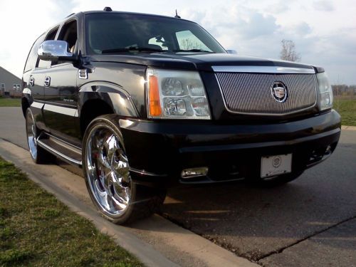 2004 Cadillac Escalade AWD with 26 inch rims and factory rims new winter tires, image 3