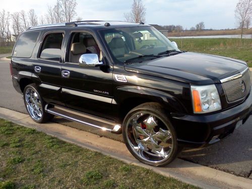 2004 Cadillac Escalade AWD with 26 inch rims and factory rims new winter tires, image 4