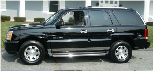 2004 Cadillac Escalade AWD with 26 inch rims and factory rims new winter tires, image 7