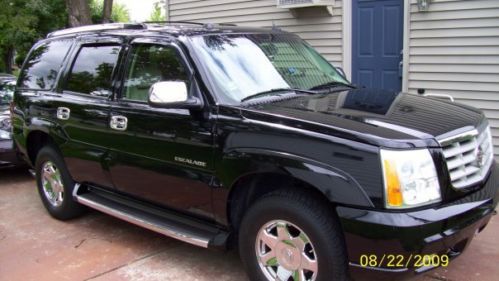 2004 Cadillac Escalade AWD with 26 inch rims and factory rims new winter tires, image 8