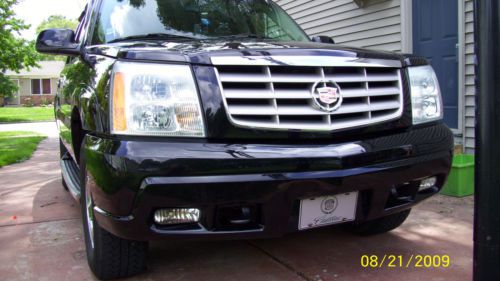 2004 Cadillac Escalade AWD with 26 inch rims and factory rims new winter tires, image 9