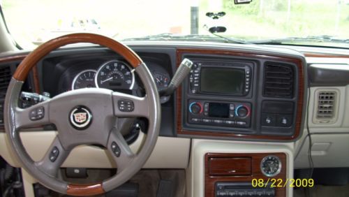 2004 Cadillac Escalade AWD with 26 inch rims and factory rims new winter tires, image 13