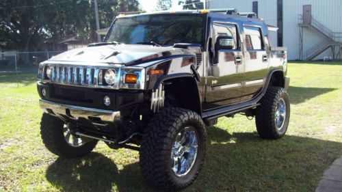 2006 luxury hummer h2 only 7000 miles! 10&#034; lift 40&#034; tires. like new!