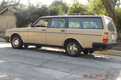 Station wagon, classic body,  utility roof rack, california car.