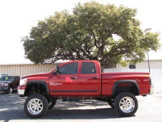 1 owner lifted slt quad pioneer cd 5.9l cummins diesel 4x4 low miles!