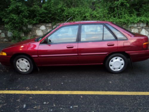 1994 escort hacback 60,000 miles automatic cold a/c no reserve