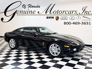 2004 jaguar xkr coupe navi 16k original mi 1 own cfax perf 100% orig books