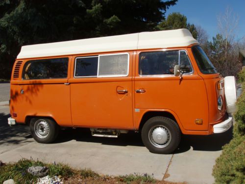 1979 vw camper van with pop up top, stove, fridge, pull out beds