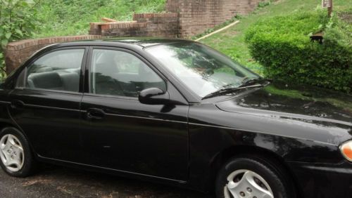 Black 2000 kia sephia - gas saver!!!