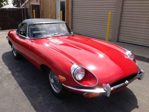 1969 jaguar e-type series two roadster. red/black. 4-speed. chrome wires. nice.