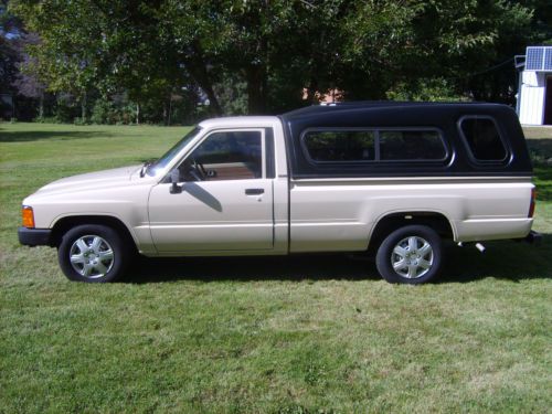 1986 toyota pickup 1/2 ton vintage very clean ! low miles was towed behind rv.