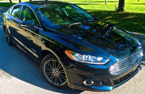 2014 ford fusion hybrid titanium / navigation/ sunroof/ rear camera/ no reserve