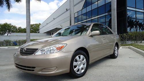 Super clean full size sedan toyota camry 4 cyl auto