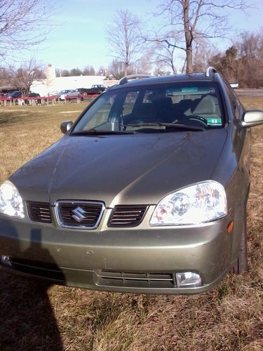 Clean lo 52k mile 05 suzuki forenza wagon auto pwr windows cd high mpg nice  !!