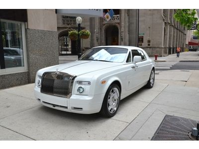 2010 rolls royce phantom coupe. english white with moccasin.