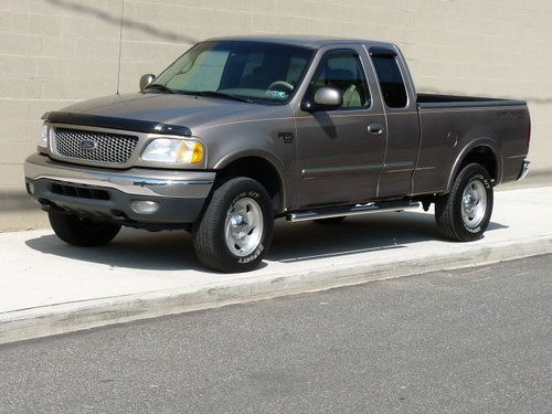 Very clean 2001 ford f150 xlt 4wd..v8..ext cab..off-road..105k miles