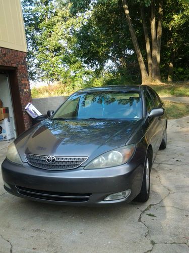 2002 toyota camry se sedan 4-door 3.0l, v6, spoiler, black leather