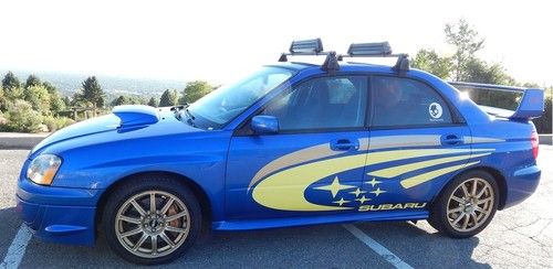 2004 subaru wrx sti rally style blue with low miles, new tires, sound system