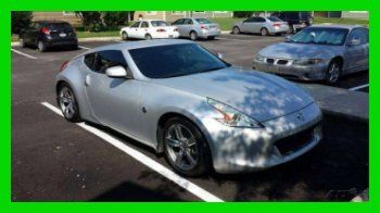 2009  nissan 370z 3.7l v6 24v automatic rwd coupe premium coupe 23k miles