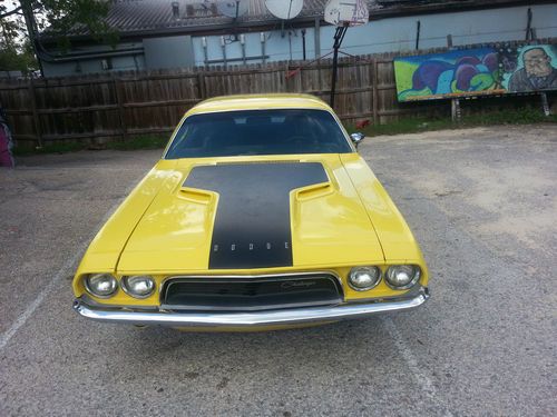 Yellow 1972 dodge challenger.  318 numbers matching.