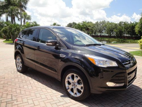 2013 ford escape sel awd black on black, carfax,  warranty and financing availab