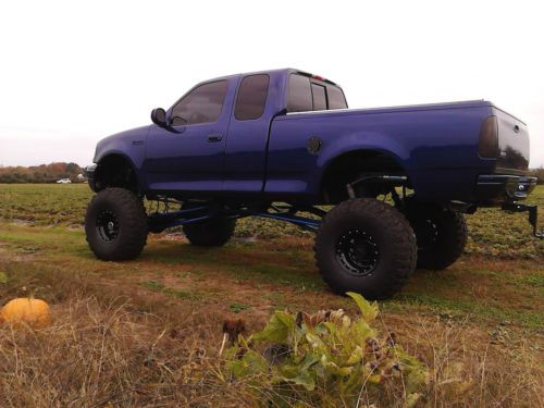 , extremely custom monster lifted supercharged ford f150 2500 miles since build!