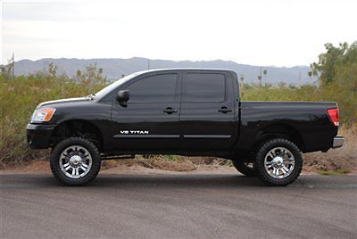 Lifted 2010 nissan titan crew cab 4x4...lifted nissan titan 4x4 crew....lifted