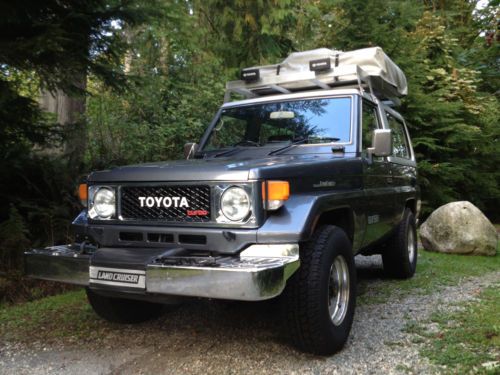 1987 toyota land cruiser bj74 4x4: factory turbo diesel, winch, a/c, remov. top