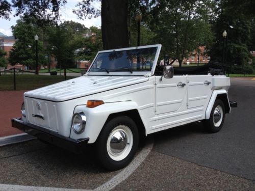 Convertible 4-speed manual with aftermarket exhaust side curtain windows