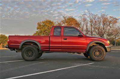 Pampered. rare. 4x4 tacoma extended cab 5-speed manual. needs nothing! :)