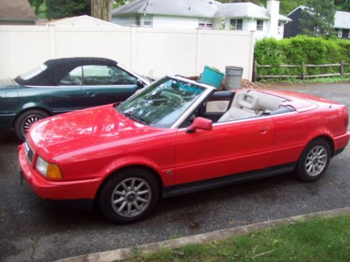 95 audi cabriolet, red/tan interior, automatic front wheel dr. 2.8 liter