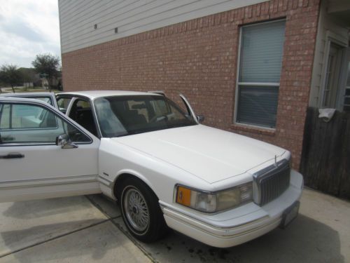 White, clean and drives smooth one owner, low mileage