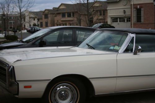 Very cool 1969 chrysler 300 convertible. the car definitely has a cool factor