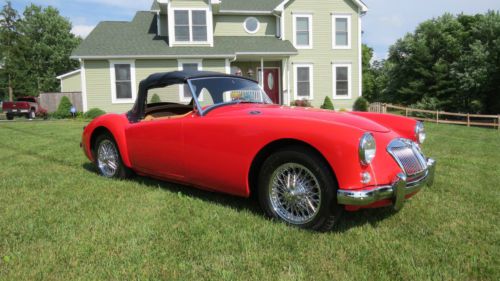 Recently restored 1959 mga, rebuilt 1500 with soft top and tonneau