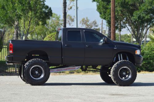 Extreme lifted custom dodge ram 1500 sport w/ comp stereo system