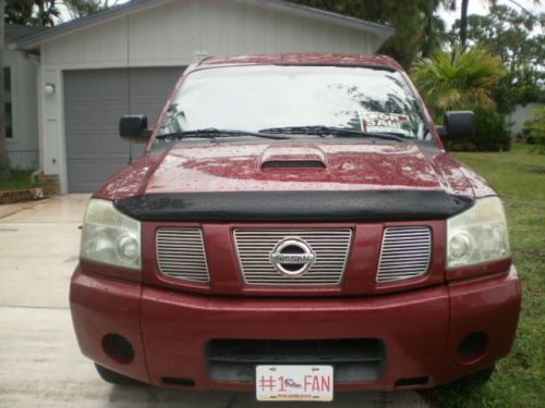 2004 nissan titan le crew cab pickup 4-door 5.6l