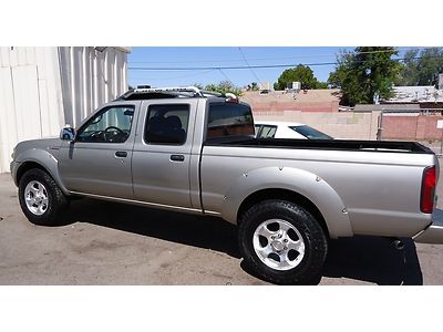 2002 nissan frontier -- 4x4 -- crew - cab - supercharger - clean - make offer !!