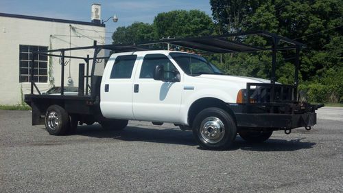 2005 f-350 crew cab dually diesel 4x4 flatbed winch 62k miles