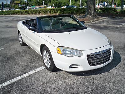 2004 chrysler sebring convertible,gtc,loaded,low miles,new top,$99.00 no reserve