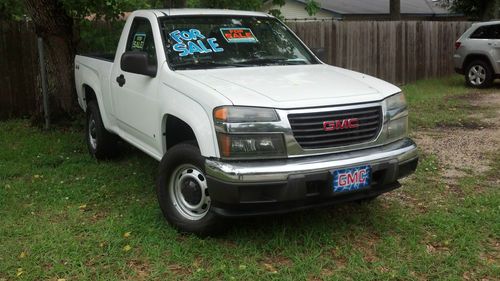 2006 gmc canyon white with blue pinstripes 4x4 5 speed on floor ice cold air .